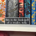 This is the bookshelf of a reader, Bella